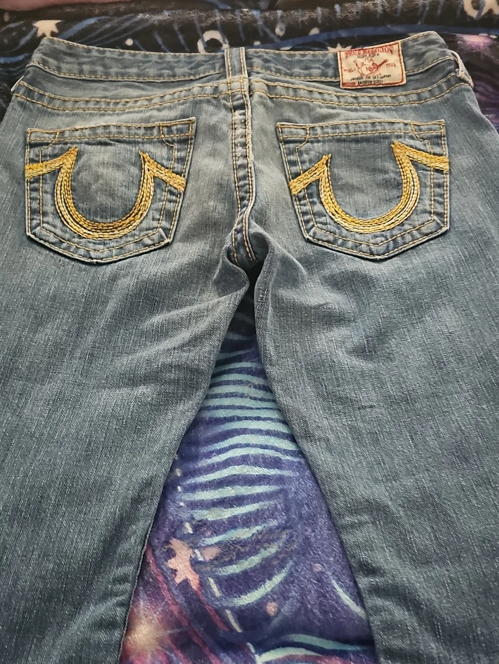 True Religion Women's Light Blue Jeans with Gold Back Pocket Stitching